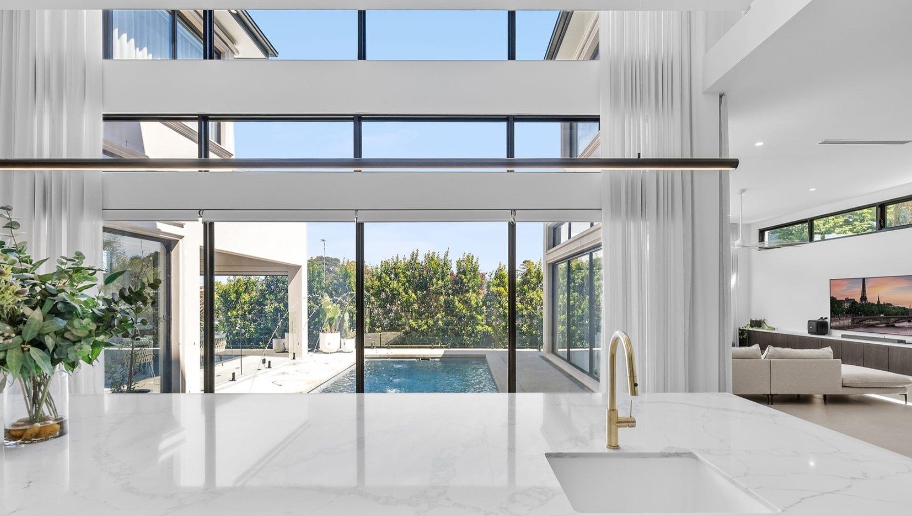 Kitchen looking out to a pool